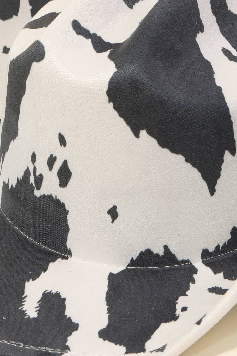 Close-up of a black and white cow print pattern