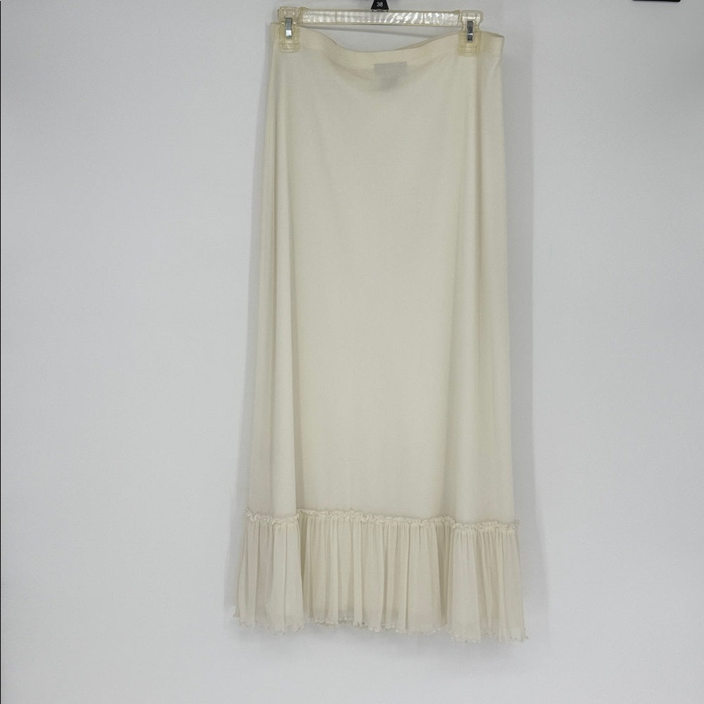 Beige dress with ruffled hem on a white background