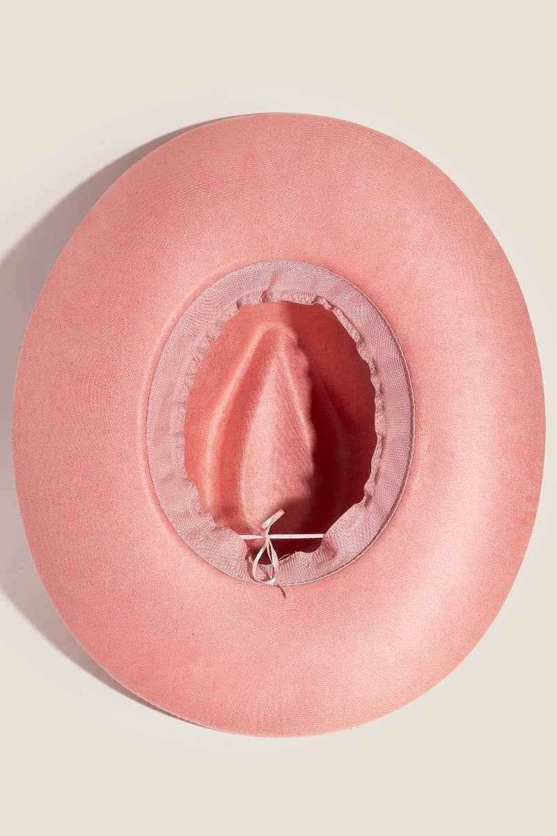 Pink hat on a beige background