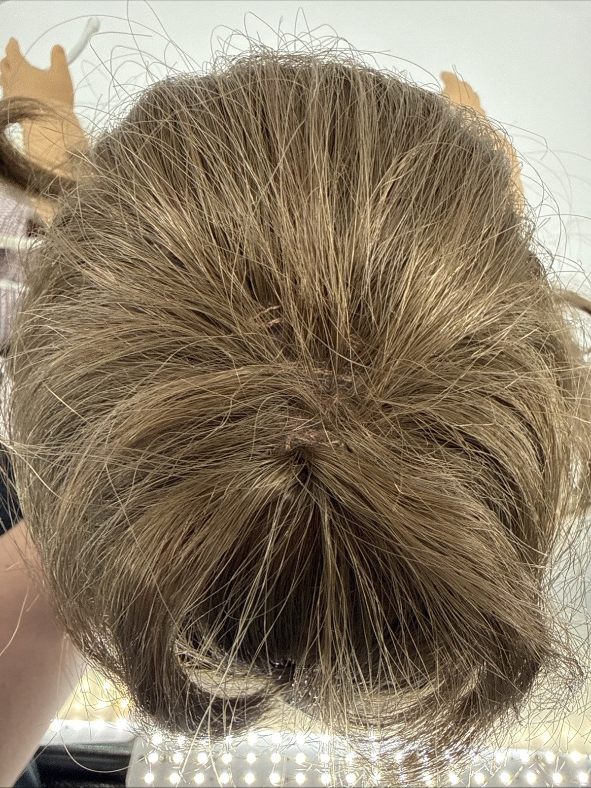 Close-up of a hair bun with a blurred background