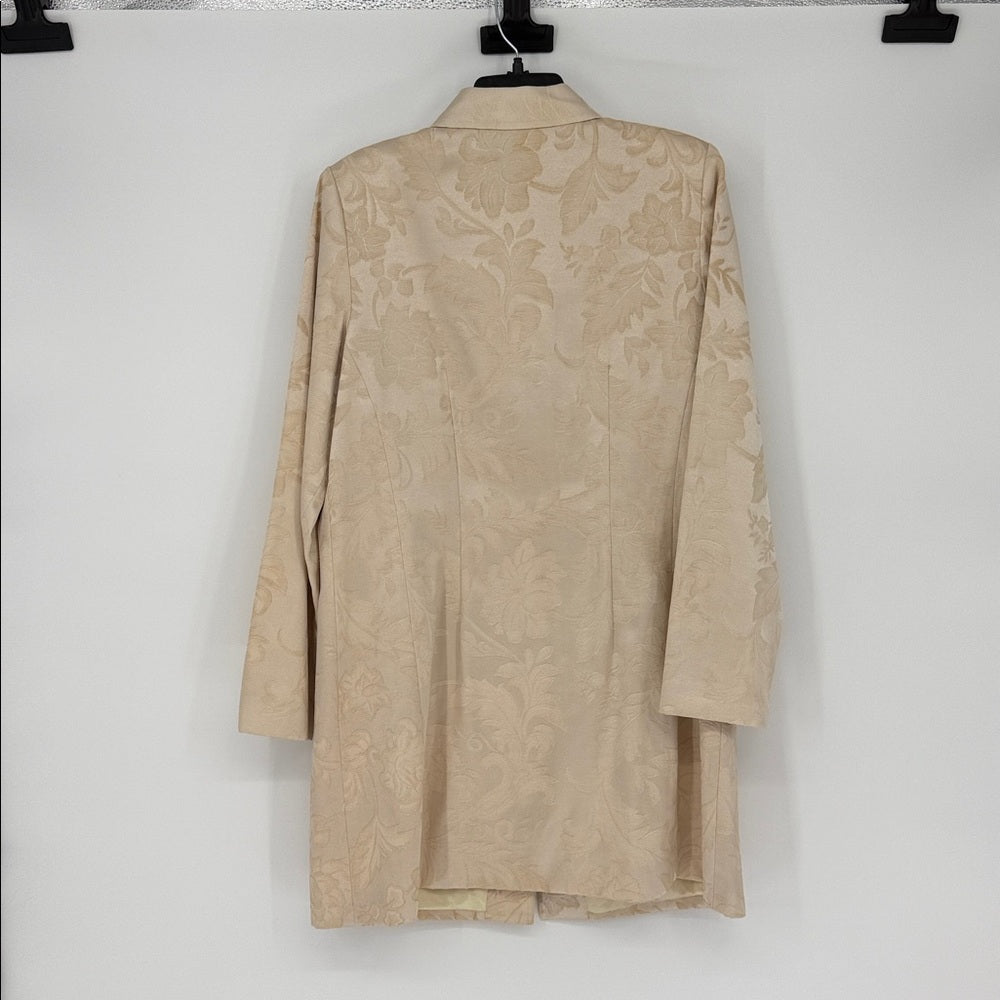 Beige floral-patterned dress on a hanger against a white background