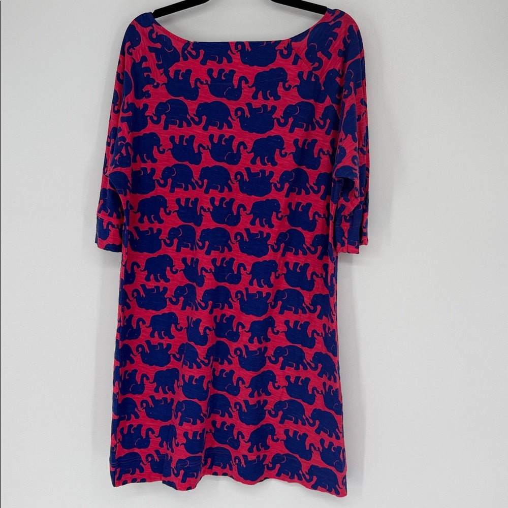 Red dress with blue elephant pattern on a white background