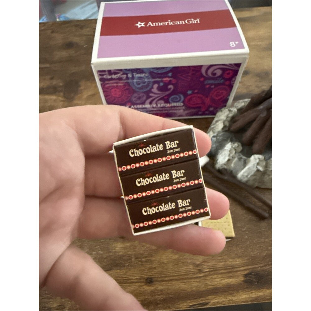 doll chocolate bar set on table 