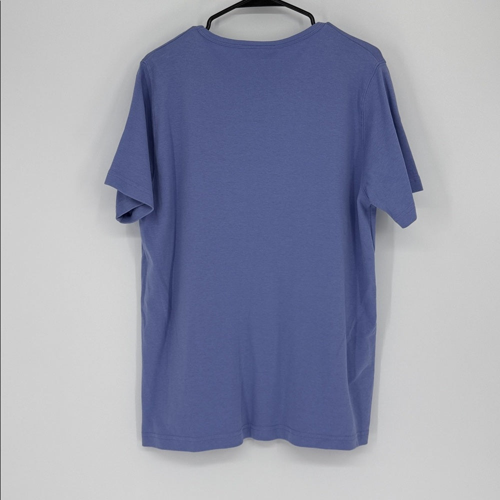 Blue t-shirt on a hanger against a white background
