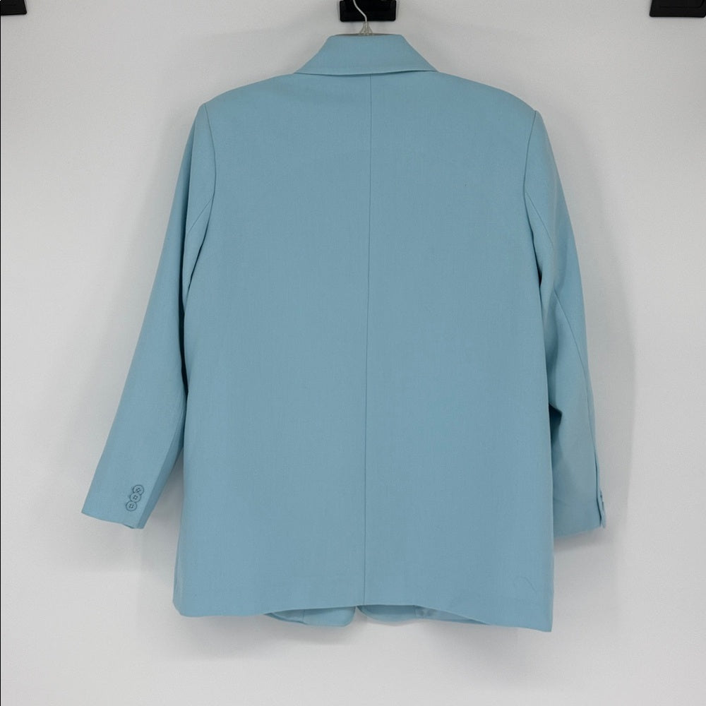 Light blue blazer on a white background