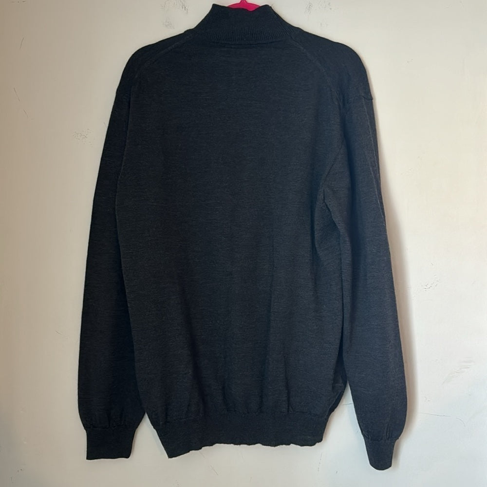 Grey turtleneck sweater on white background