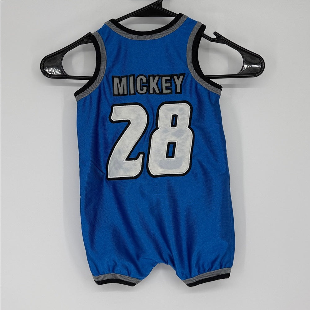 Back view of blue Mickey Mouse basketball baby romper with ‘Mickey’ name and number 28 graphic, gray trim, and sleeveless design.
