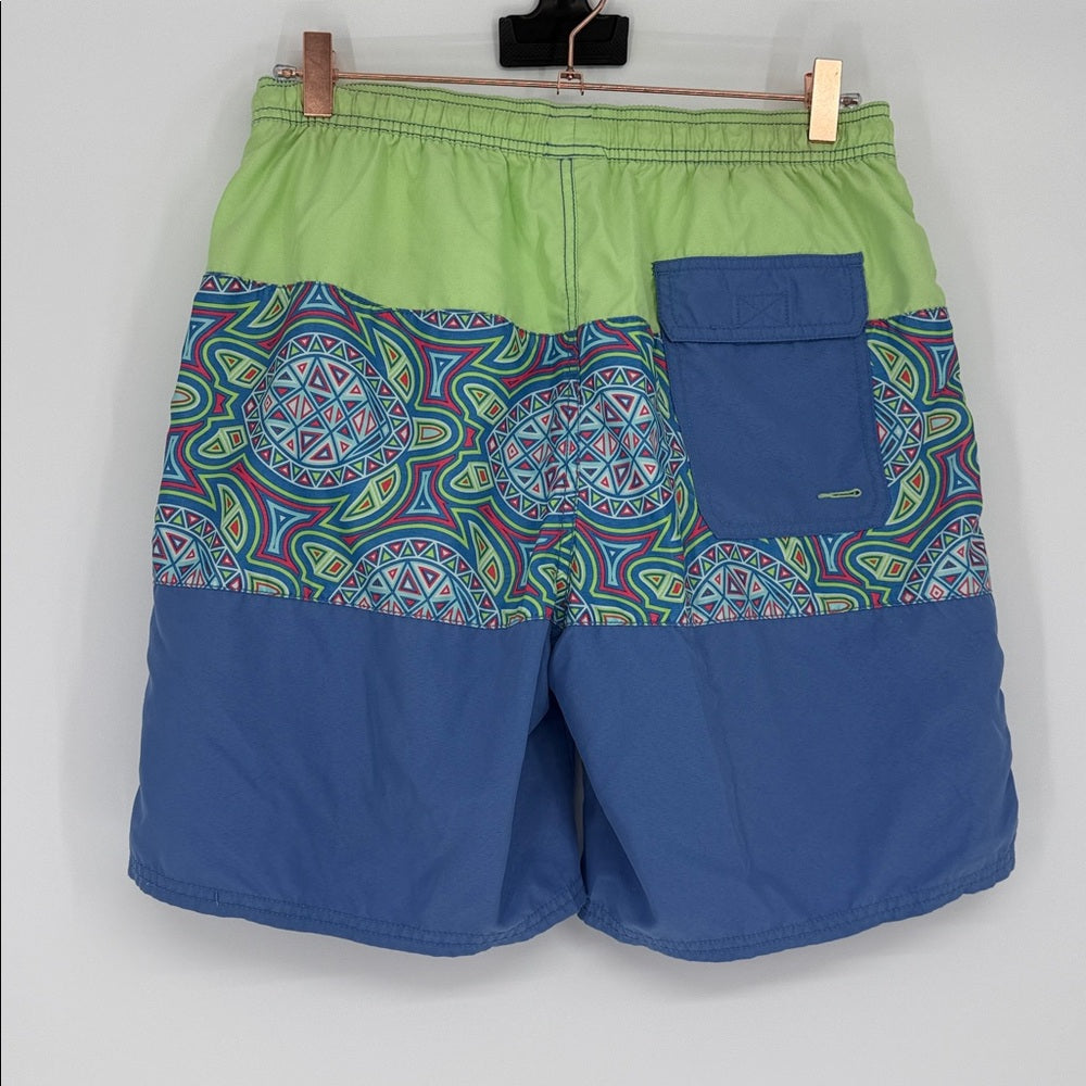 Blue and green shorts with a patterned design on a white background