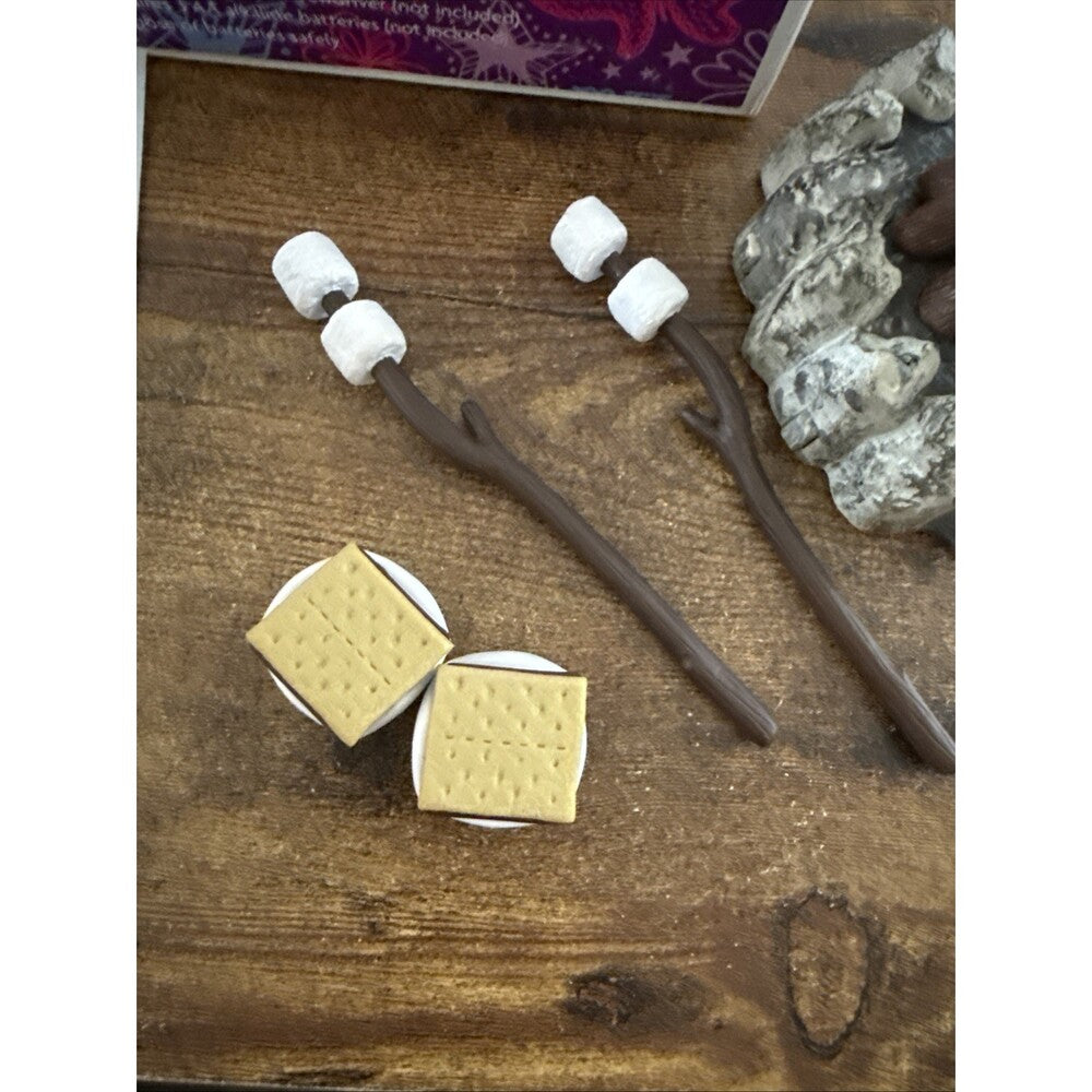 campfire doll set on table 