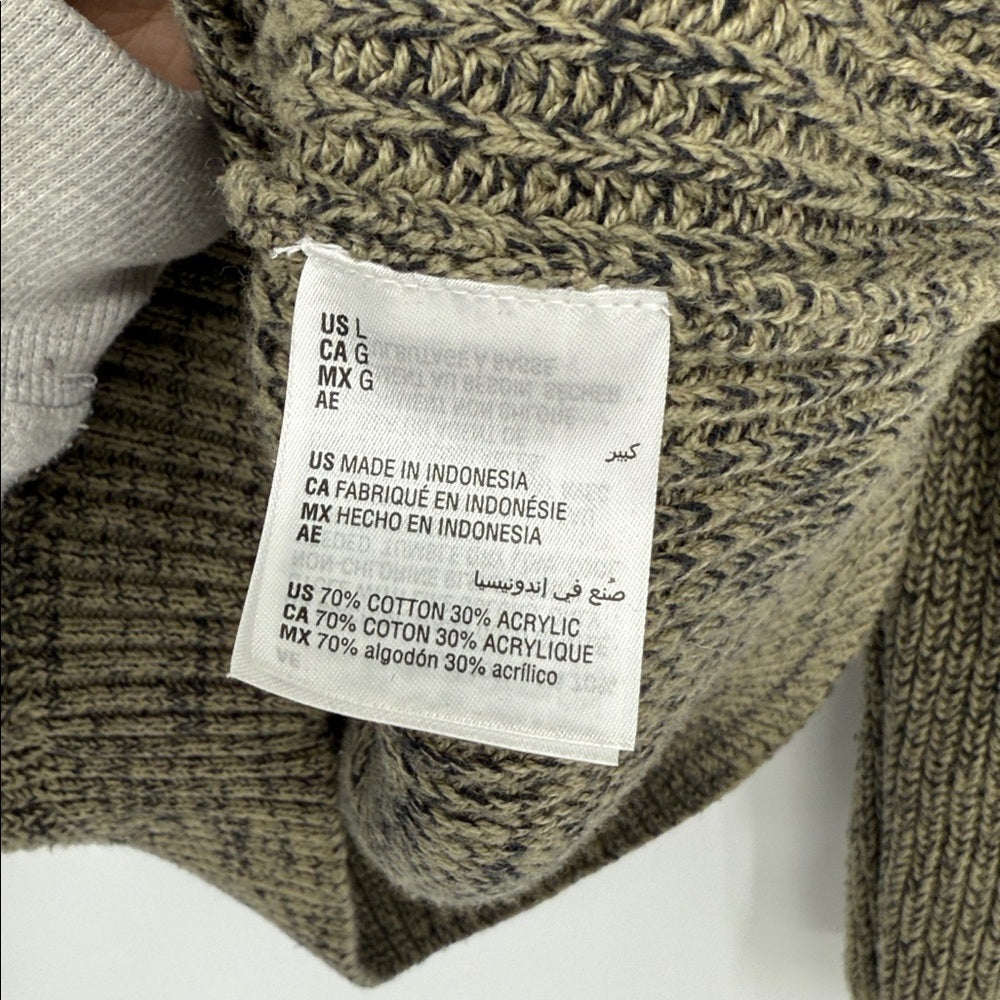 Textile label on a knitted sweater with fabric details