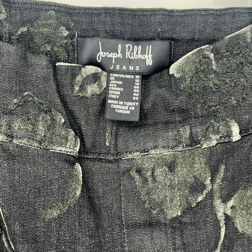 Close-up of a camouflage-patterned jeans with a Joseph Ribkoff label.