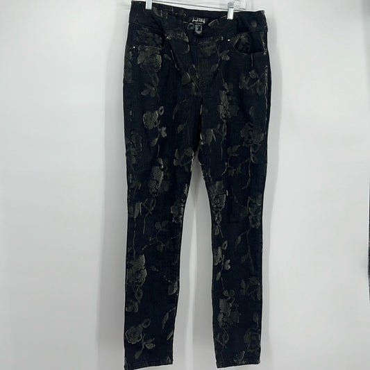 Black floral-patterned pants on a white background